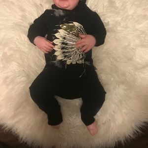 Rags to Raches romper